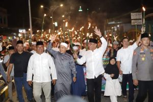 Jafar Sukhairi Bersama Ribuan Warga Madina Pawai Obor Sambut Tahun Baru Islam 1445 H