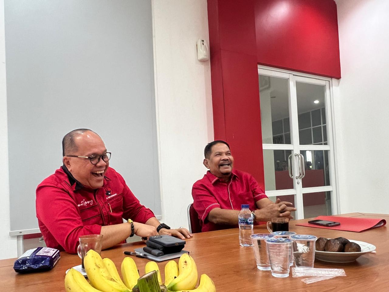 Rahudman bersama Junimart Girsang