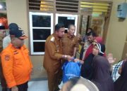 Plt Walikota dan Kalaksa BPBD Kota Binjai Salurkan Bantuan kepada Warga Terdampak Banjir