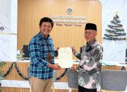 Kantah Serdang Bedagai Serahkan Sertipikat PTSL kepada Ketua FKUB 