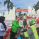Sambut HUT RI ke-80, PKB Kota Medan Bagikan Ribuan Bendera Merah Putih dan Bantuan BBM untuk Driver Ojol