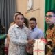 Kanwil BPN Sumut Bersama Pemkab Langkat dan Komisi II DPR RI Serahkan Sertipikat Tanah dan BMD melalui Program PTSL
