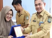 14 ASN Resmi Purna Bhakti, Sekda Binjai Serahkan Penghargaan atas Dedikasi Puluhan Tahun Mengabdi
